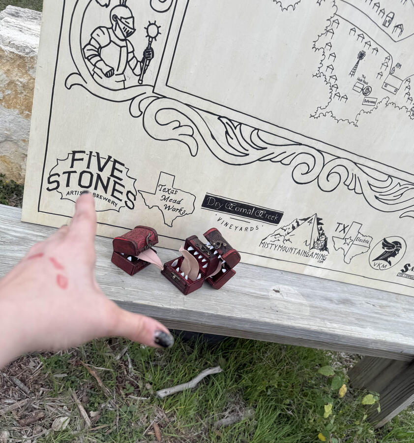 I was trying to get a picture of the sign. They started chewing on each other instead. Typical!